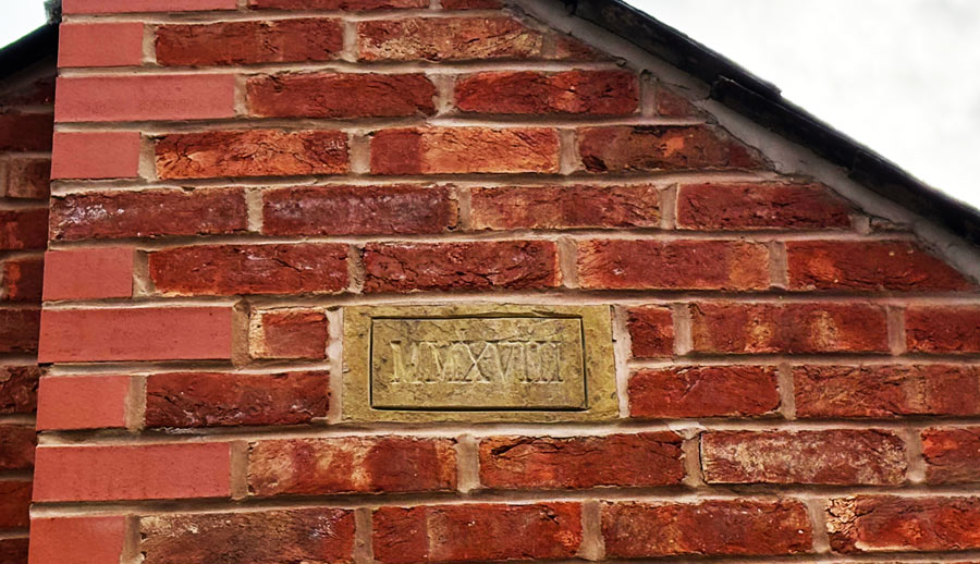Date Stone for house House wall with date stone