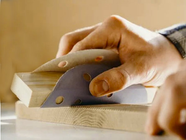 Sanding wood by hand